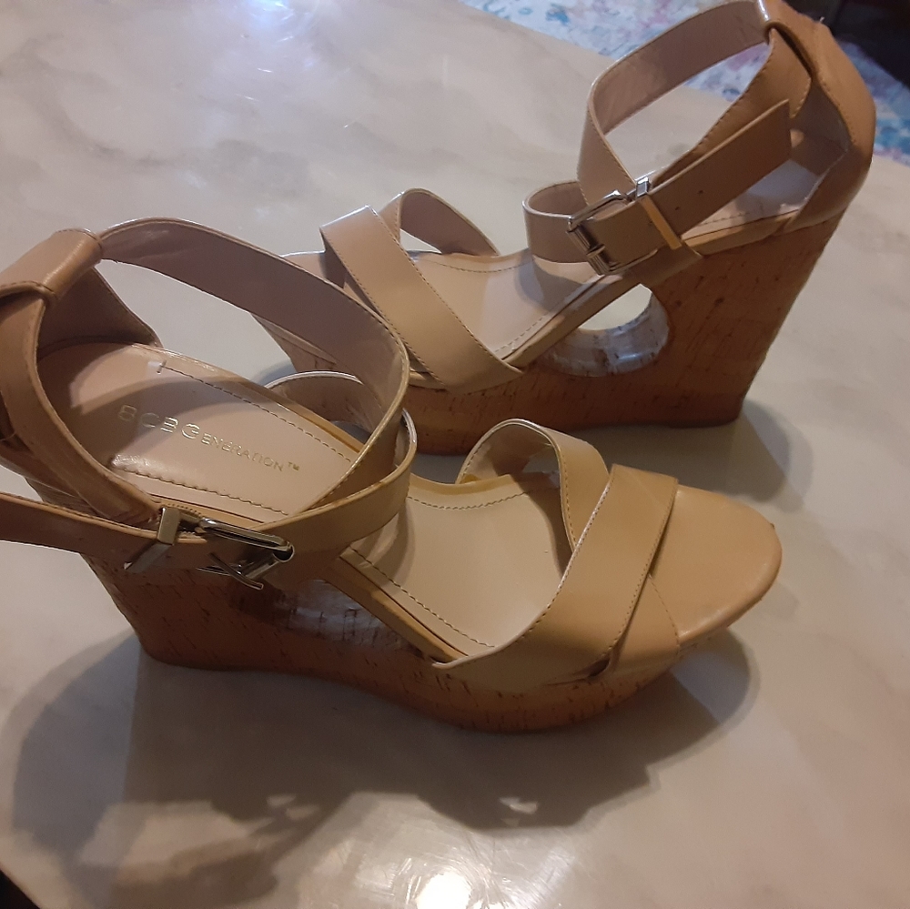 A pair of BCBG women shoes.